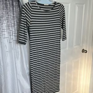 Horizontal white and drey striped dress. Fitted, slightly stretchy.